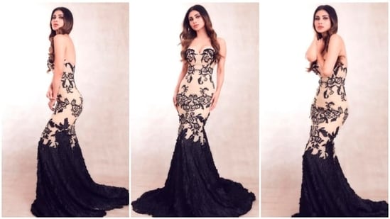 The ever so stylish Mouni Roy recently blessed our feeds with stunning photos of herself in a fancy red carpet beige and black mermaid gown.(Instagram/@imouniroy)