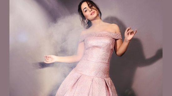 In her journey from television to movies, actor Hina Khan has kept us hooked to her fashion evolution and her pictures from the latest photoshoot have no different effect as she looks ready to dazzle at a cocktail night in pink off-shoulder gown.(Instagram/realhinakhan)