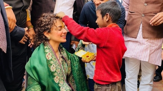 Sharing pictures with a child she met in Mathura, she wrote, "Radhe Radhe."(Instagram)