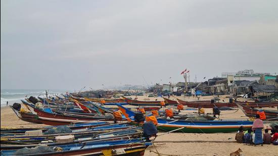 Fishing boats anchored ashore amid Cyclone Jawad threat in Puri, on Saturday. (PTI)