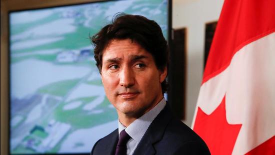 Canada's Prime Minister Justin Trudeau speaks to reporters at the provincial legislature in Victoria, British Columbia, Canada on November 26. (REUTERS)