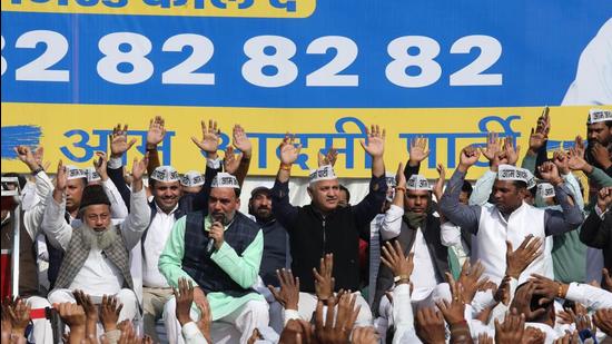 Aam Aadmi Party senior leader Manish Sisodia and AAP Delhi convenor Gopal Rai during the launch of the MCD Badlaav campaign at the AAP office in New Delhi on Saturday. (HT photo)
