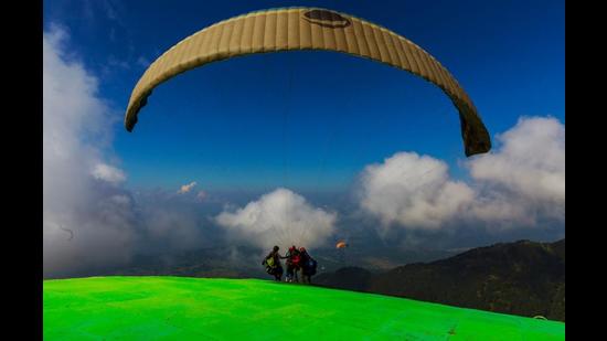 A tandem flight being conducted from Billing take-off site in Kangra district. (Shailash Bhatnagar)