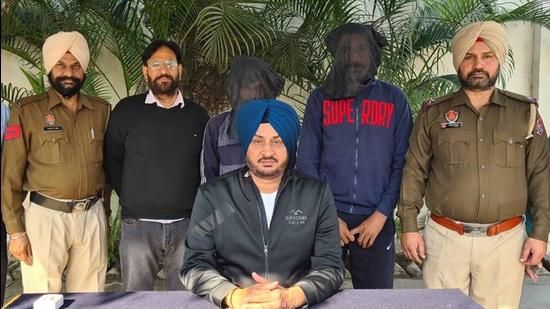 The two gang members in CIA staff custody in Ludhiana in Ludhiana on Saturday. (HT Photo)