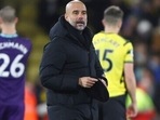 Manchester City's head coach Pep Guardiola walks on the pitch after the English Premier League soccer match between Watford and Manchester City at the Vicarage Road Stadium in Watford. Manchester City's head coach Pep Guardiola walks on the pitch after the English Premier League soccer match between Watford and Manchester City at the Vicarage Road Stadium in Watford.