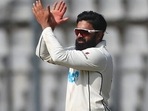 New Zealand's Ajaz Patel fields during day three of their second test cricket match with India in Mumbai, India, Sunday, Dec. 5, 2021.