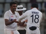 India's Ravichandaran Ashwin, left, share a light moment with Virat Kohli during the day three of their second test cricket match with New Zealand in Mumbai, India, Sunday, Dec. 5, 2021.(AP Photo/Rafiq Maqbool)(AP) India's Ravichandaran Ashwin, left, share a light moment with Virat Kohli during the day three of their second test cricket match with New Zealand in Mumbai, India, Sunday, Dec. 5, 2021.(AP Photo/Rafiq Maqbool)(AP)