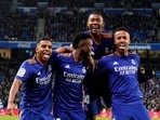 Real Madrid's Vinicius Junior celebrates scoring their first goal with teammates&nbsp;
