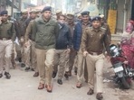 SSP Mathura Dr Gaurav Grover leads a police march through lanes and market of Mathura city on Thursday (HT Photo) SSP Mathura Dr Gaurav Grover leads a police march through lanes and market of Mathura city on Thursday (HT Photo)