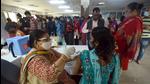 A woman gets a dose of a Covid-19 vaccine at the District Hospital in Noida Sector 30 on Sunday. (Sunil Ghosh/HT) A woman gets a dose of a Covid-19 vaccine at the District Hospital in Noida Sector 30 on Sunday. (Sunil Ghosh/HT)