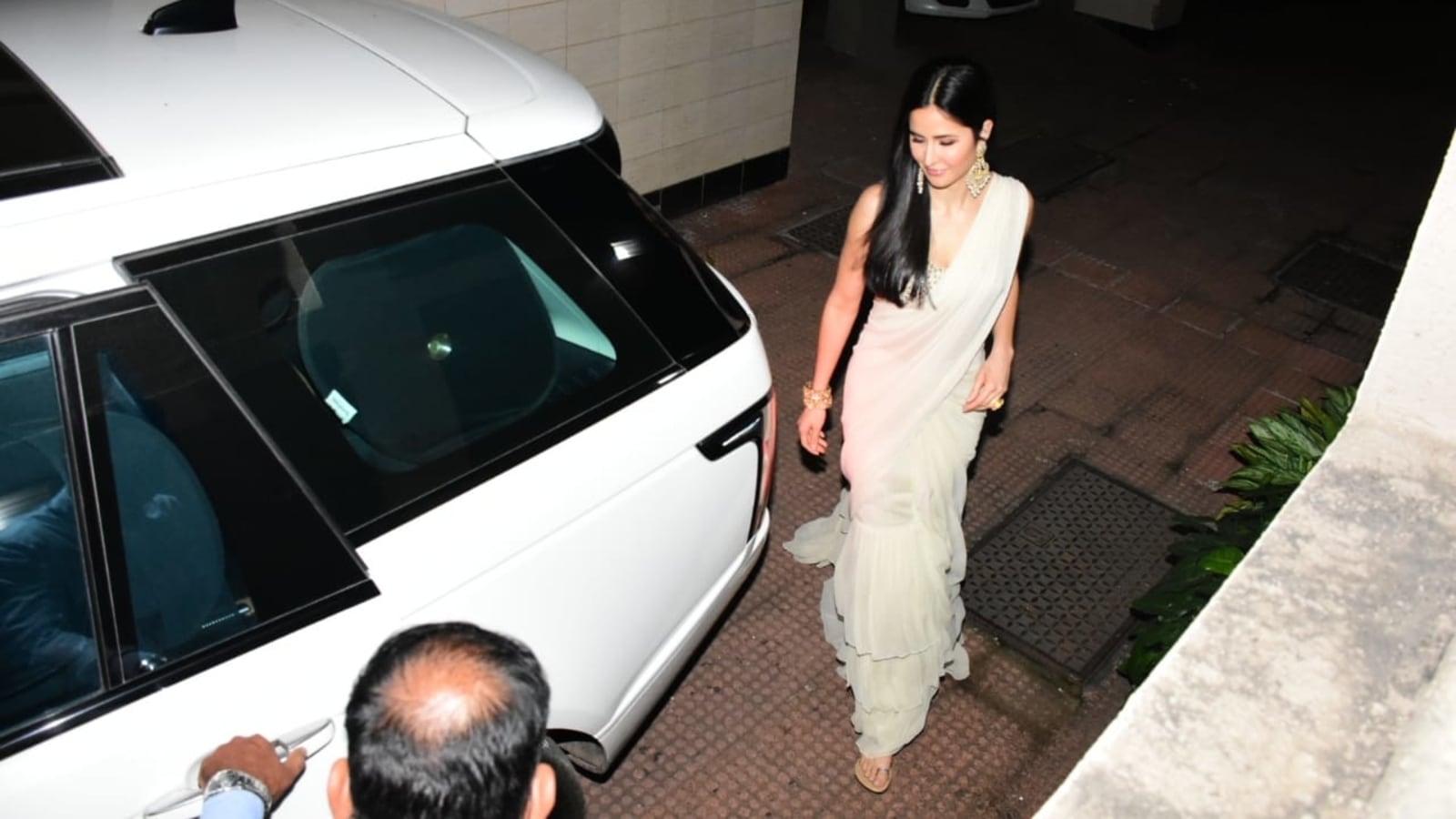 Katrina Kaif heads to Vicky Kaushal's home with mom ahead of their wedding, decks up in white saree. See pics