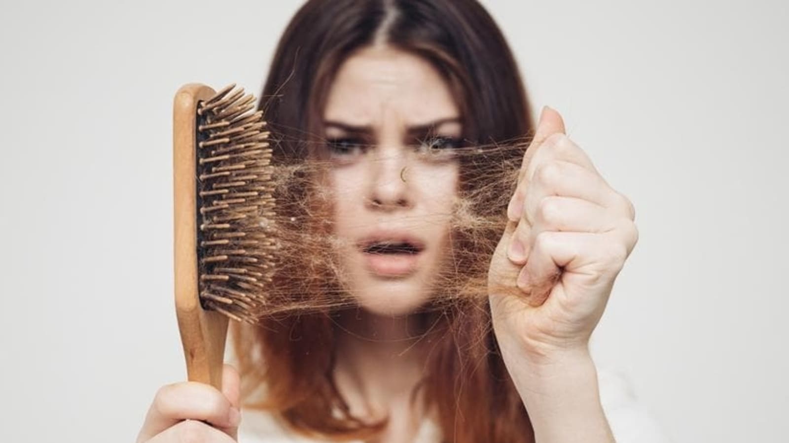 Hair Loss in Women Causes and Treatments for Every Age  GoodRx