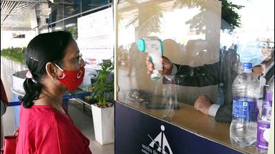 A woman undergoes thermal screening before entering Jayprakash Narayan International Airport amid a threat of the new Covid-19 variant 'Omicron', in Patna on Sunday. (ANI) A woman undergoes thermal screening before entering Jayprakash Narayan International Airport amid a threat of the new Covid-19 variant 'Omicron', in Patna on Sunday. (ANI)