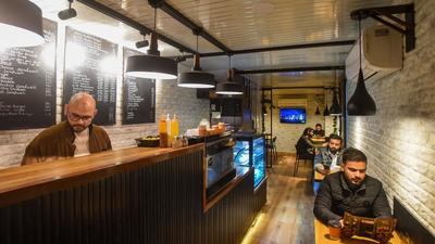 The Ebony cafe has emerged as a popular hangout in Jama Masjid area. (Amal KS/Hindustan Times)