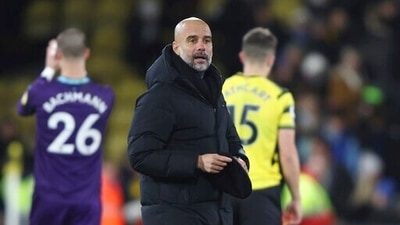 Manchester City's head coach Pep Guardiola walks on the pitch after the English Premier League soccer match between Watford and Manchester City at the Vicarage Road Stadium in Watford. (AP) Manchester City's head coach Pep Guardiola walks on the pitch after the English Premier League soccer match between Watford and Manchester City at the Vicarage Road Stadium in Watford. (AP)