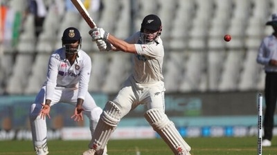 New Zealand's Henry Nicholls plays a shot during the day three of their second test cricket match with India in Mumbai, India, Sunday, Dec. 5, 2021.(AP Photo/Rafiq Maqbool) (AP) New Zealand's Henry Nicholls plays a shot during the day three of their second test cricket match with India in Mumbai, India, Sunday, Dec. 5, 2021.(AP Photo/Rafiq Maqbool) (AP)