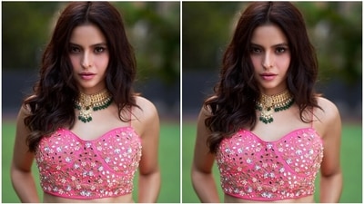 Centre-parted open tresses styled in soft curls, glossy pink lip shade, shimmery pink eye shadow, sleek eyeliner, mascara-laden eyelashes, blushed cheeks, and glowing skin rounded off the glam picks. (Instagram/@aamnasharifofficial)