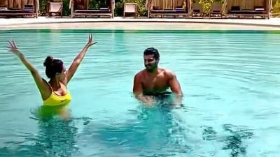 Arjun Kapoor enjoys pool-time with Malaika Arora in Maldives. Arjun Kapoor enjoys pool-time with Malaika Arora in Maldives.