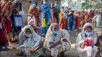 Beneficiaries wait to receive Covid-19 vaccine doses in Nadia district in West Bengal on Sunday. (PTI) Beneficiaries wait to receive Covid-19 vaccine doses in Nadia district in West Bengal on Sunday. (PTI)