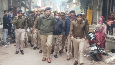 SSP Mathura Dr Gaurav Grover leads a police march through lanes and market of Mathura city on Thursday (HT Photo) SSP Mathura Dr Gaurav Grover leads a police march through lanes and market of Mathura city on Thursday (HT Photo)