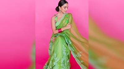 Floral sarees can make any woman look elegant. Kiara Advani kept her look subtle yet elegant as she donned this stunning green saree and floral blouse. (Instagram/@kiaraaliaadvani) Floral sarees can make any woman look elegant. Kiara Advani kept her look subtle yet elegant as she donned this stunning green saree and floral blouse. (Instagram/@kiaraaliaadvani)