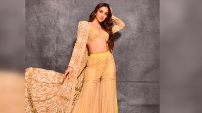 Recently, Kiara Advani took to her Instagram handle to share a few stills of herself in a yellow embellished bralette and sharara set. (Instagram/@kiaraaliaadvani) Recently, Kiara Advani took to her Instagram handle to share a few stills of herself in a yellow embellished bralette and sharara set. (Instagram/@kiaraaliaadvani)