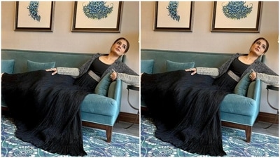 The midriff-baring gown came with a shimmery silver belt detail in the waist. The shrug, in black, white and silver, added the glitters to her attire. (Instagram/@officialraveenatandon)