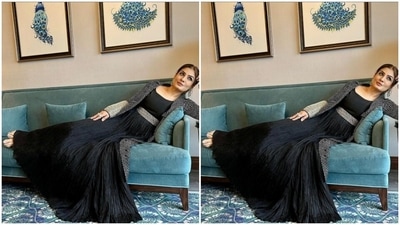 Styled by Richa Ranawat, Raveena wore her tresses into a clean bun with a middle part. (Instagram/@officialraveenatandon)