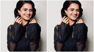 From the shelves of the designer house Jade, Amrut picked a stunning black ensemble for the photoshoot. (Instagram/@amrutasubhash)