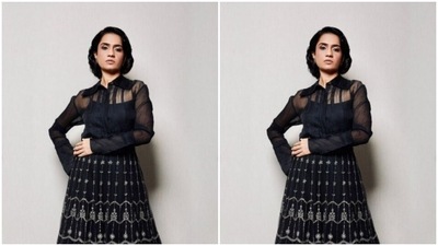 Amruta paired a translucent black shirt with a black skirt, embroidered in white motifs. (Instagram/@amrutasubhash)