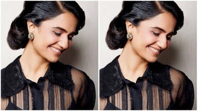 Assisted by makeup artists Shruti and Yashaswini, Amruta opted for a minimal makeup look. In grey eyeshadow, black eyeliner, mascara-laden eyelashes, black kohl, drawn eyebrows, contoured cheeks and a shade of nude lipstick, Amruta looked ravishing. (Instagram/@amrutasubhash)