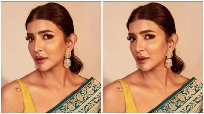 Styled by Anshika Verma, Lakshmi wore her hair into a clean bun with a middle part and opted for a minimal makeup look. (Instagram/@lakshmimanchu)
