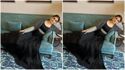 Raveena decked up in a black flowy gown and teamed it with an embellished shrug. (Instagram/@officialraveenatandon)