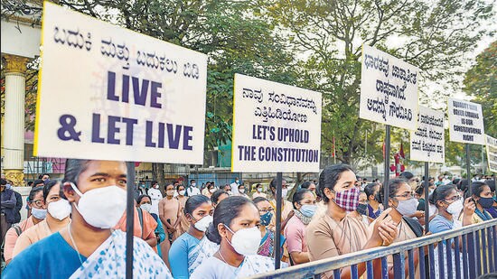Members of the Christian community participate in a silent protest against the Anti-Conversion bill proposed in the Winter Session of Karnataka Legislative Assembly, in Bengaluru on Saturday. (PTI)