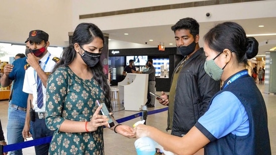 The Karnataka government has issued new COVID guidelines allowing visitors with double dose of Covid-19 vaccination to enter shopping malls and cinema halls after two cases of Omicron variant were reported in the state.(PTI)