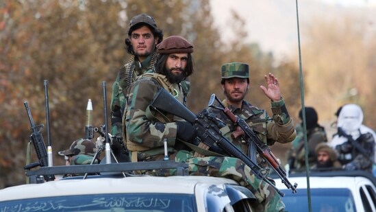 Members of Taliban sit on a military vehicle during Taliban military parade in Kabul, Afghanistan.(Reuters)