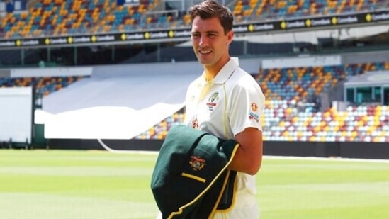 Australian captain Pat Cummins waits on the field after posing with the Ashes trophy at the Gabba cricket ground ahead of the first Ashes cricket test in Brisbane, Australia, Sunday, Dec. 5, 2021.(AP) Australian captain Pat Cummins waits on the field after posing with the Ashes trophy at the Gabba cricket ground ahead of the first Ashes cricket test in Brisbane, Australia, Sunday, Dec. 5, 2021.(AP)