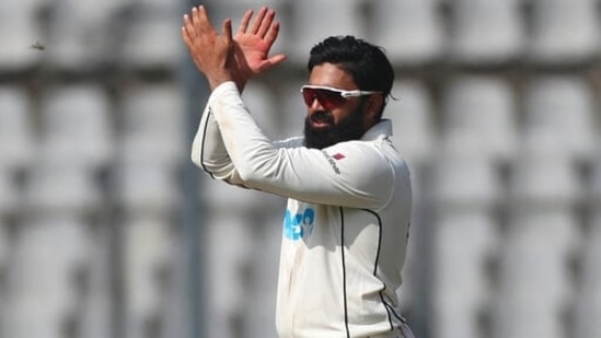 New Zealand's Ajaz Patel fields during day three of their second test cricket match with India in Mumbai, India, Sunday, Dec. 5, 2021.(AP)