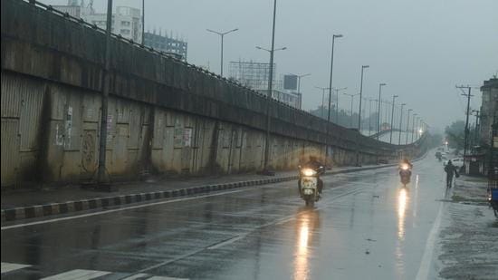 NH-5 wears a deserted look amid incessant rains owing to cyclone Jawad, in Bhubaneswar, on Sunday. (PTI)