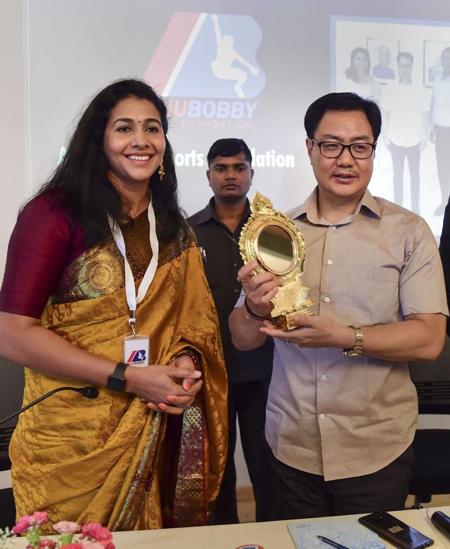 Former Union Sports Minister Kiren Rijiju and Athlete Anju Bobby George (PTI) Former Union Sports Minister Kiren Rijiju and Athlete Anju Bobby George (PTI)