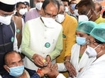 Madhya Pradesh chief minister Shivraj Singh Chouhan during the launch of a mega inoculation drive in Bhopal.(ANI File Photo)