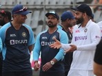 Virat Kohli speaks with coach Rahul Dravid on Day 4 of the second Test against New Zealand&nbsp;