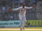 Axar Patel celebrates after the dismissal of Daryl Mitchell during Day 2 of the second Test