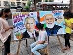 Students in Mumbai paint portraits of Russian President Vladimir Putin and Prime Minister Narendra Modi ahead of former's visit to India, on Saturday.(ANI Photo)