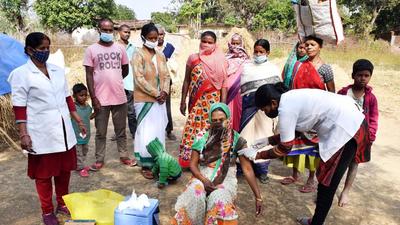 A woman receives a dose of Covid vaccine during a door-to-door vaccination campaign at Bogai Bera Panchayat, in Ranchi on Monday. (ANI)