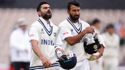 India's Virat Kohli and Cheteshwar Pujara&nbsp; (Action Images via Reuters)