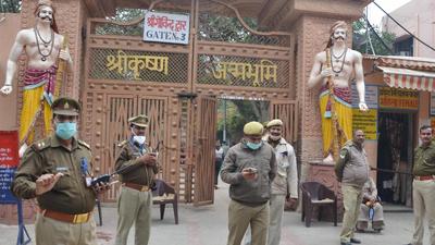 Police personnel guard outside the Sri Krishna Janambhoomi temple in Mathura. (PTI photo) Police personnel guard outside the Sri Krishna Janambhoomi temple in Mathura. (PTI photo)