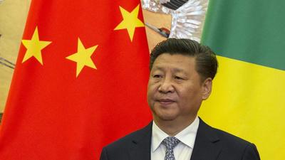 Chinese President Xi Jinping stands in front of national flags of China and Republic of Congo during a meeting with visting Congolese dignitaries at the Great Hall of the People in Beijing, China, in 2016. (AP/ FILE) Chinese President Xi Jinping stands in front of national flags of China and Republic of Congo during a meeting with visting Congolese dignitaries at the Great Hall of the People in Beijing, China, in 2016. (AP/ FILE)