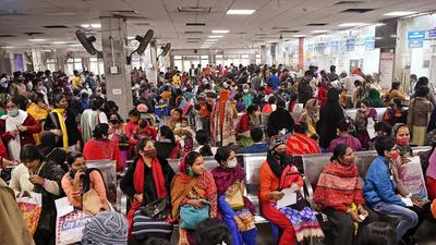 People wait at the outpatient department of Safdarjung Hospital as resident doctors protest at Safdarjung hospital on Monday. (ANI)