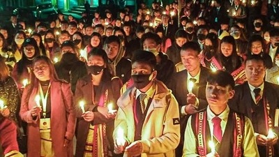 People participate in a demonstration in Nagaland’s Mon district on Sunday night following the killings of civilians. (PTI)
